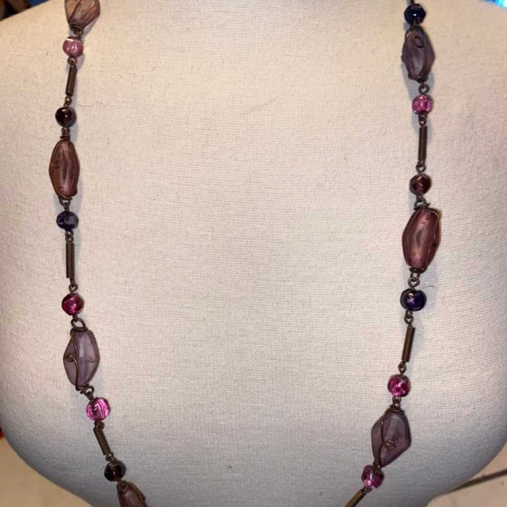 Purple hue stones on this long vintage necklace - image 4