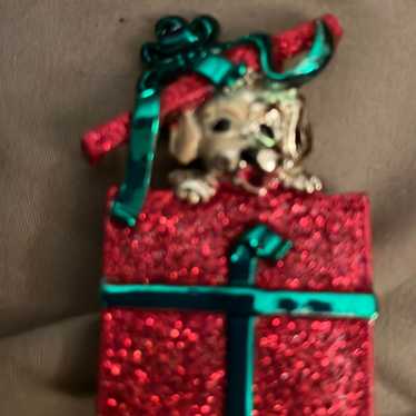A holiday broach pin. It’s a puppy in a Christmas… - image 1