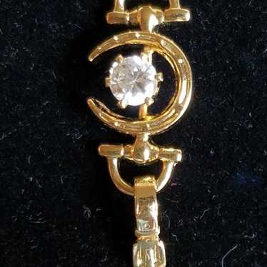 Goldtone Horseshoe Bracelet With Cz - image 1