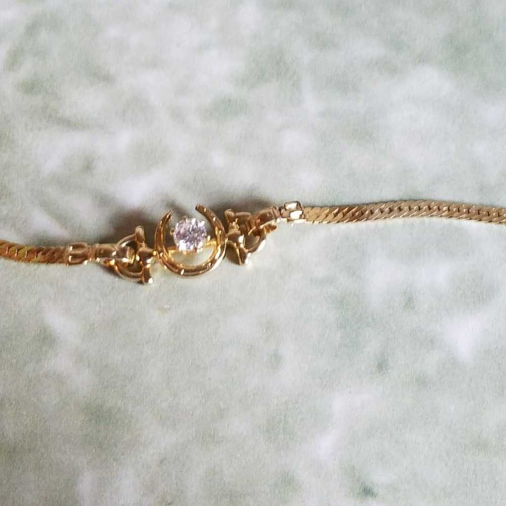 Goldtone Horseshoe Bracelet With Cz - image 4