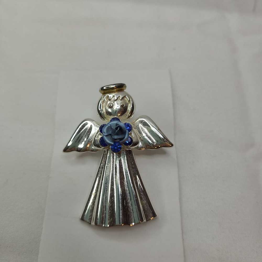 Vintage metal silver angel with blue flower and g… - image 1