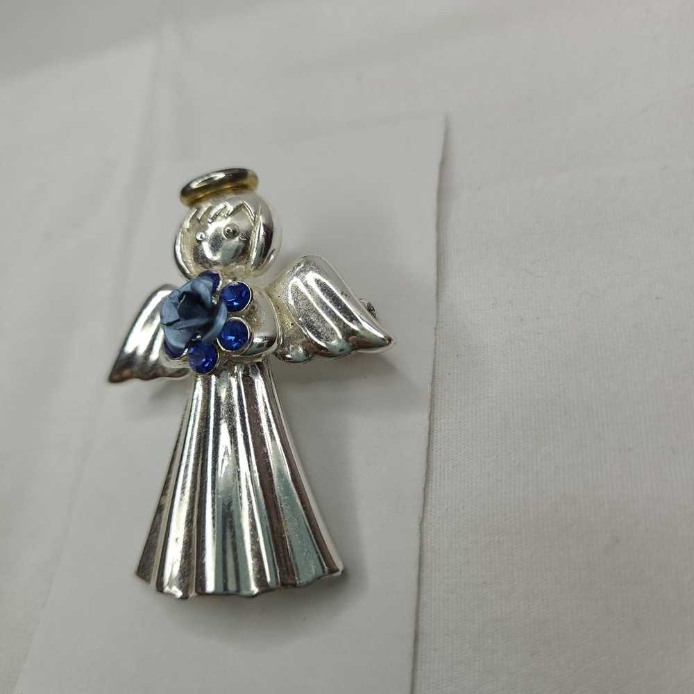 Vintage metal silver angel with blue flower and g… - image 2