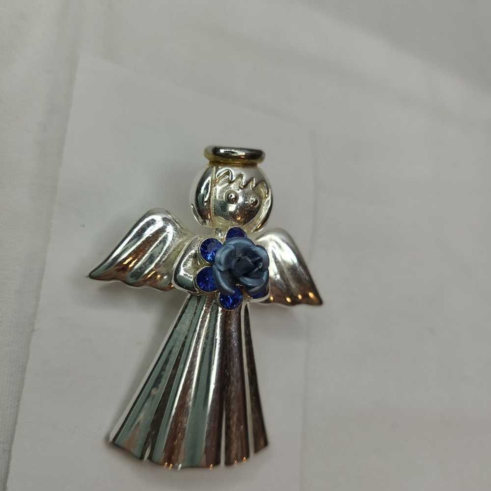 Vintage metal silver angel with blue flower and g… - image 3