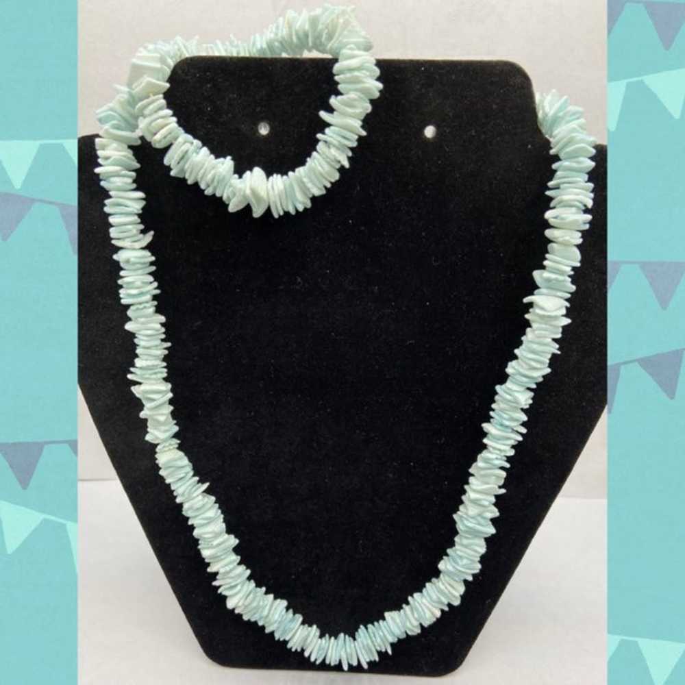 Vintage Pastel turquoise color puka shell necklac… - image 1