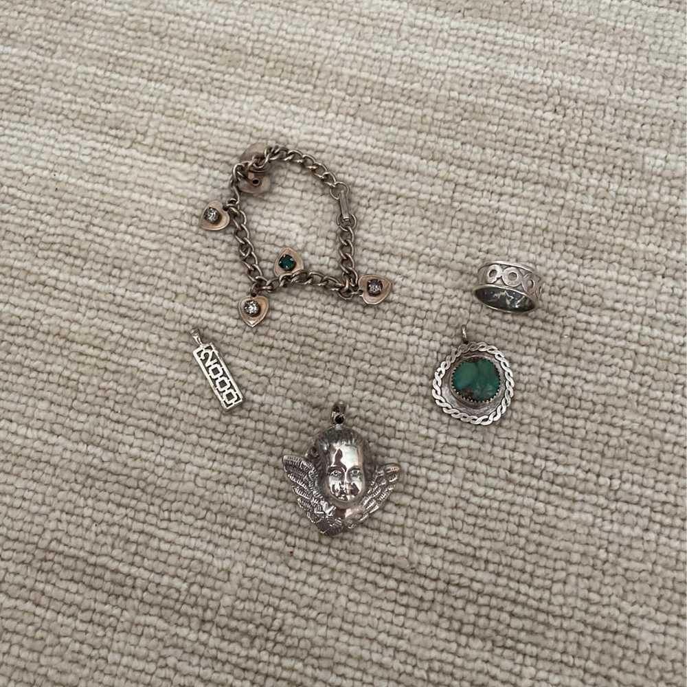 Silver ring, trinket, and charms - image 1