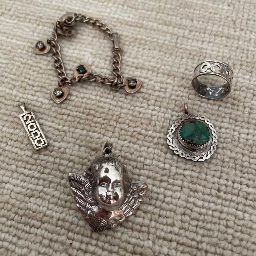 Silver ring, trinket, and charms - image 2