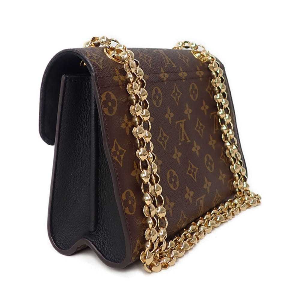 Louis Vuitton Victoire leather handbag - image 2