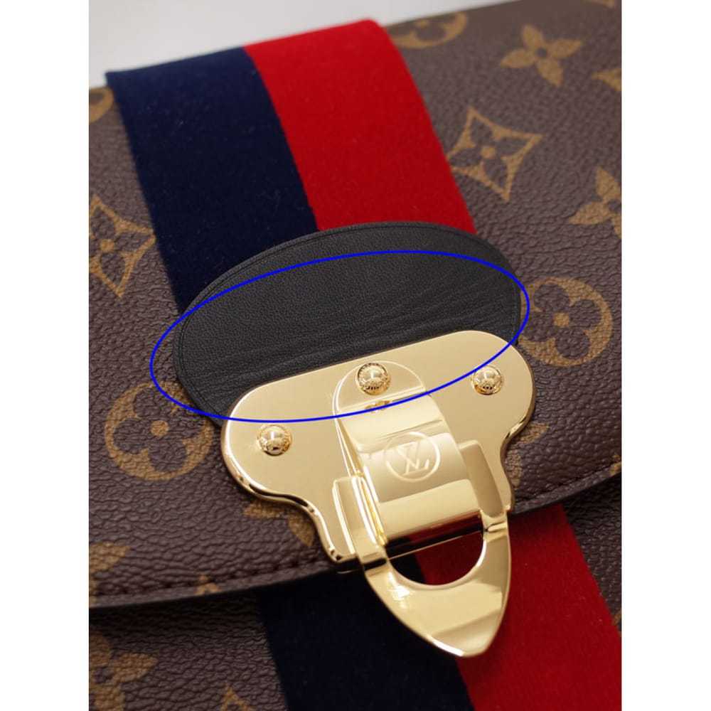 Louis Vuitton Georges leather handbag - image 6
