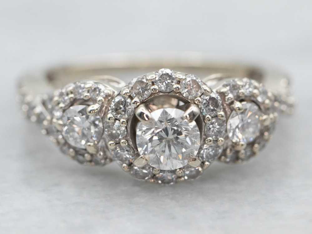 Modern Three Stone Diamond Halo Engagement Ring - image 1