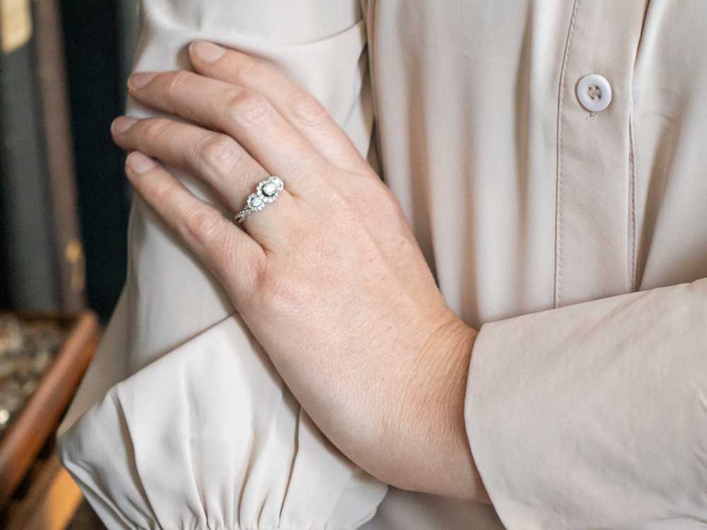 Modern Three Stone Diamond Halo Engagement Ring - image 4