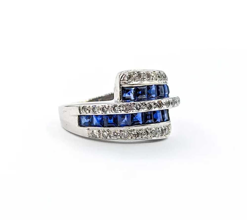 Blue Sapphire & Diamond Bypass Ring In White Gold - image 5