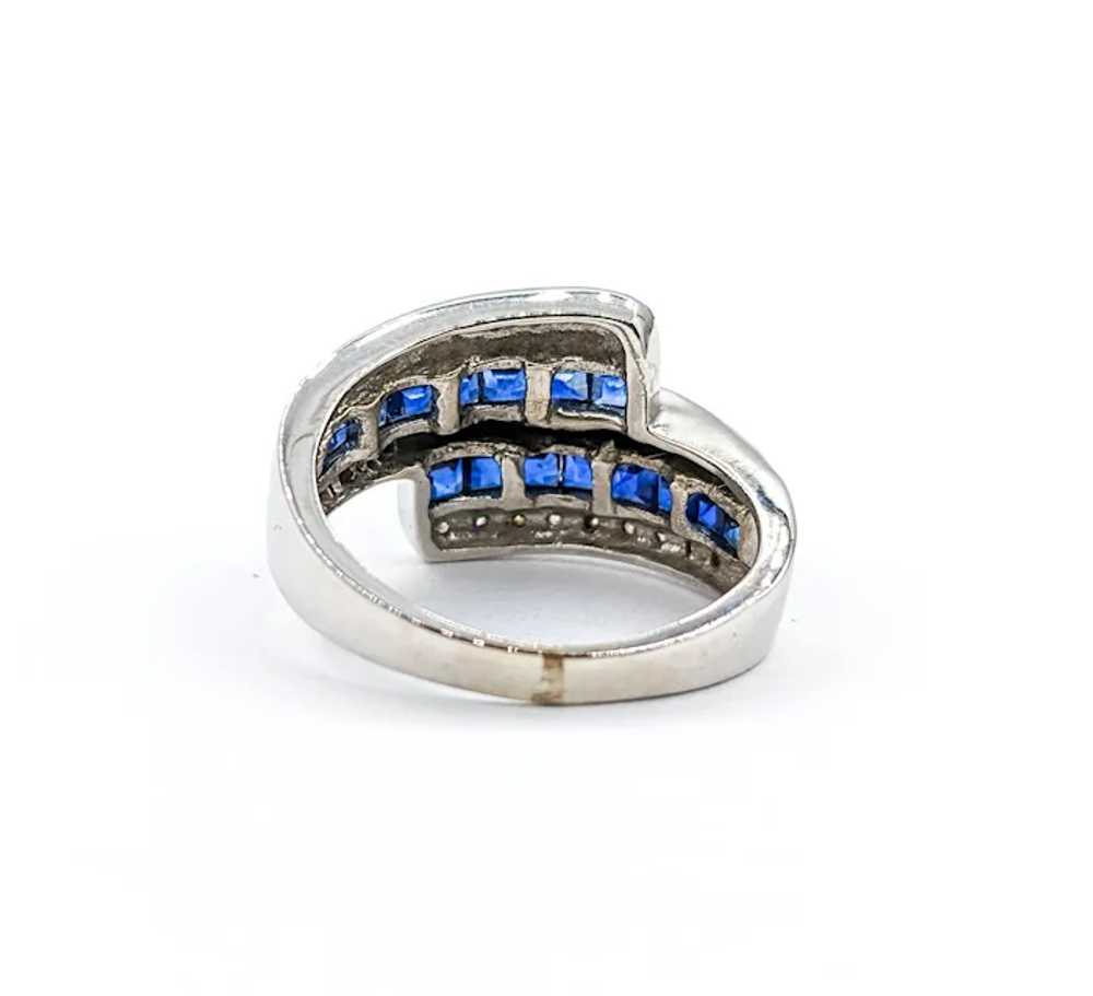 Blue Sapphire & Diamond Bypass Ring In White Gold - image 9