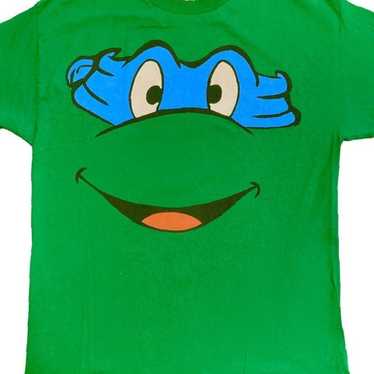 https://img.gem.app/913000085/1t/1703440127/teenage-mutant-ninja-turtles-donatello-t-shirt.jpg