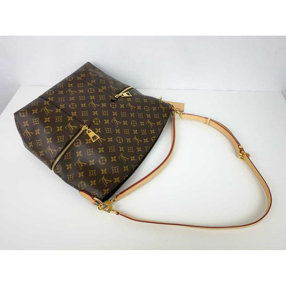 Louis Vuitton Mélie leather handbag - image 8