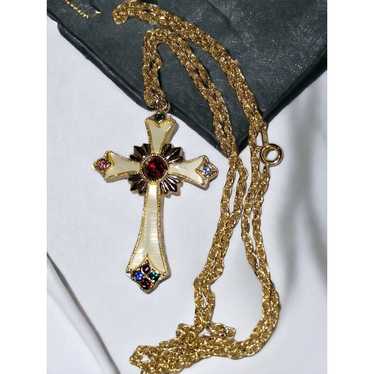 Absolutely beautiful bejeweled gold cross with Ruby in the hot middle