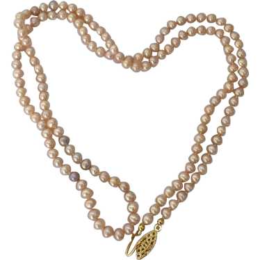 Long Creamy Pink Pearl Necklace - image 1