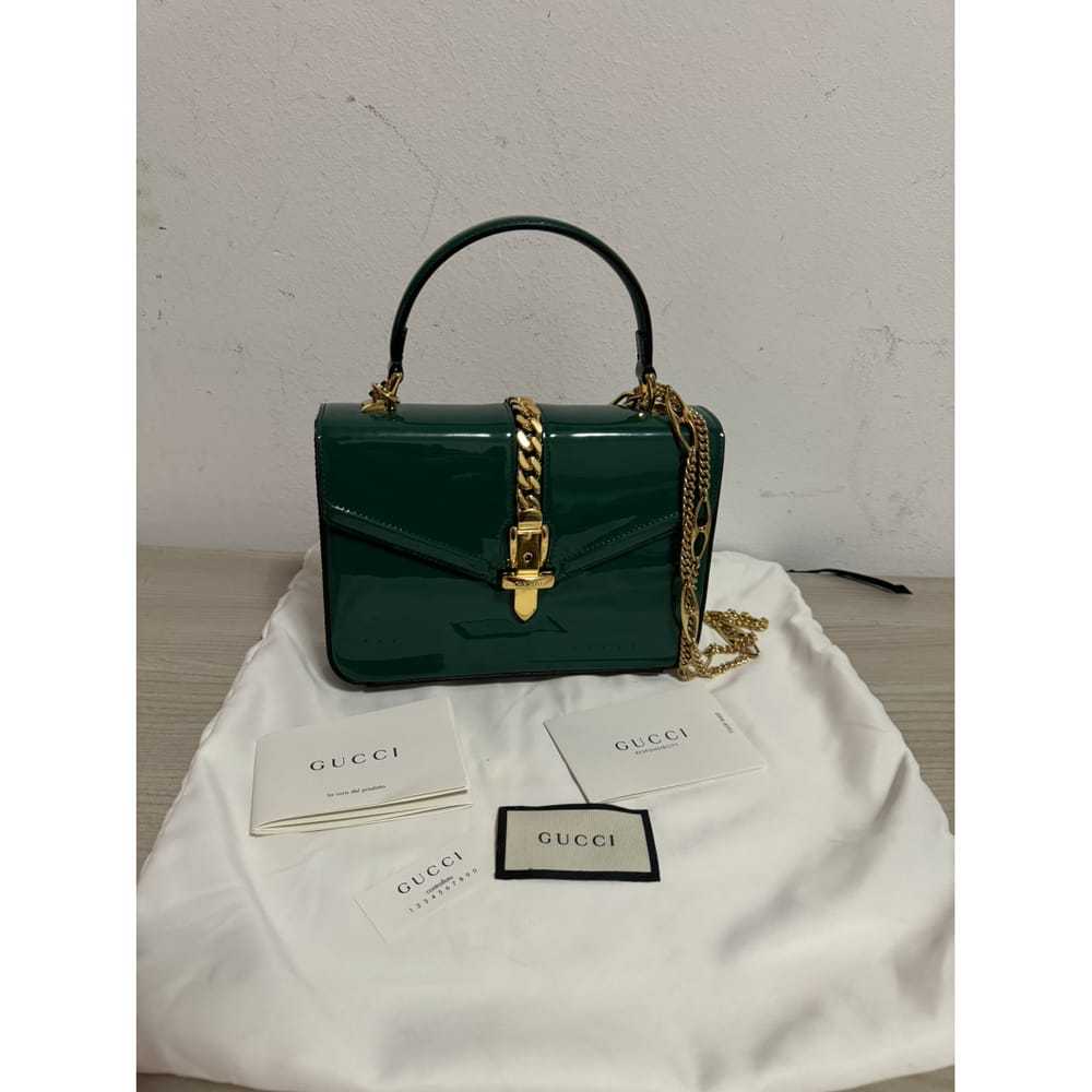 Gucci Sylvie 1969 patent leather handbag - image 10