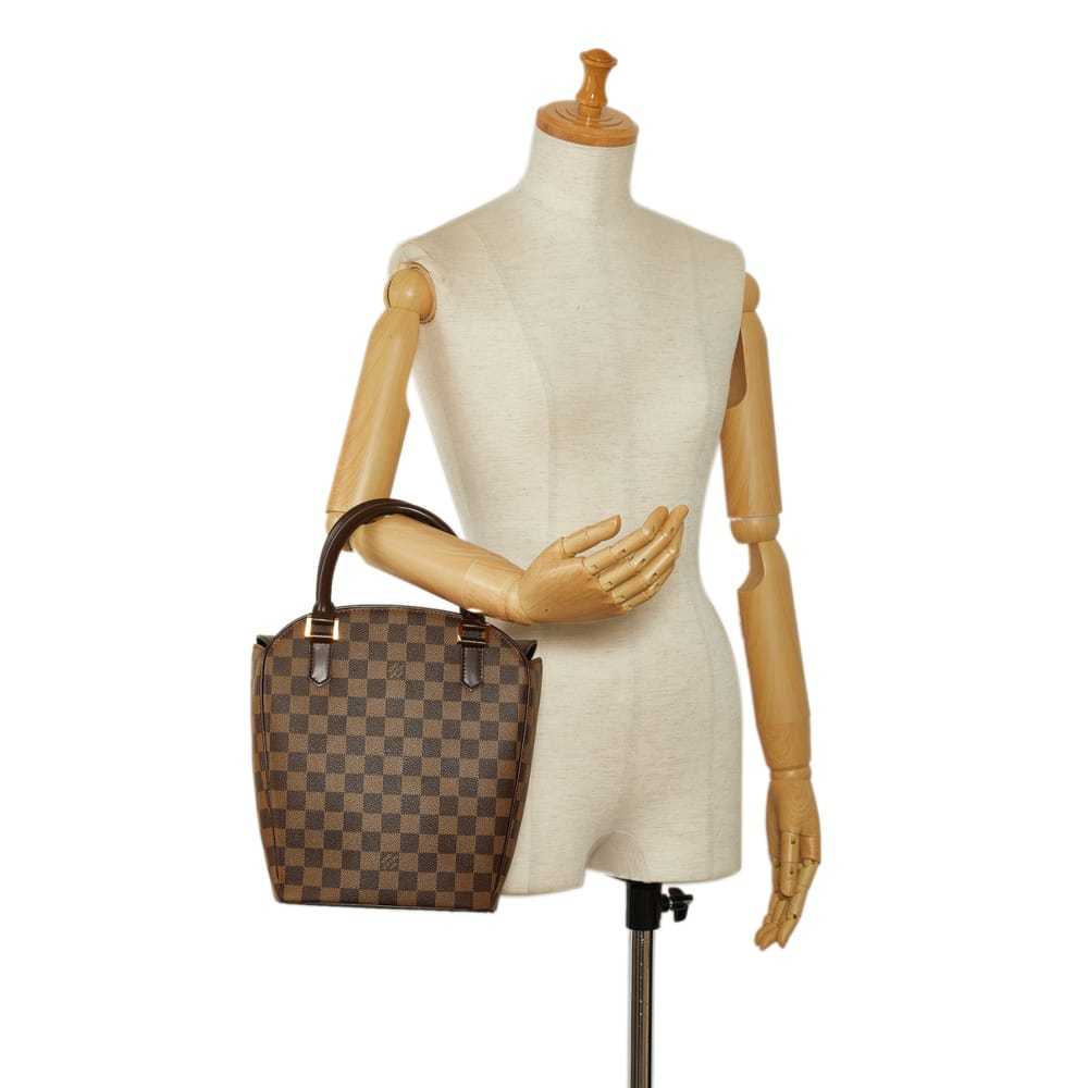 Louis Vuitton Sarria leather handbag - image 10