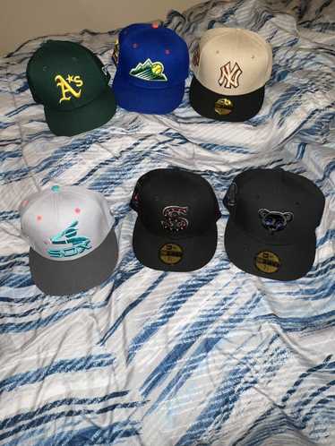 Lids × New Era Multiple hats being sold.