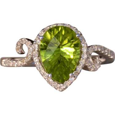 Peridot and Natural Diamond Ring in White Gold