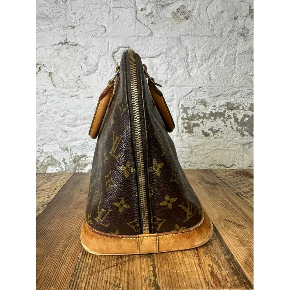 Louis Vuitton Alma cloth handbag - image 3