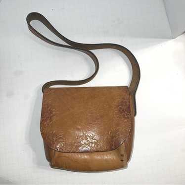 VNTG tooled leather shoulder bags