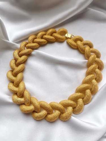 gold tone braided necklace - image 1
