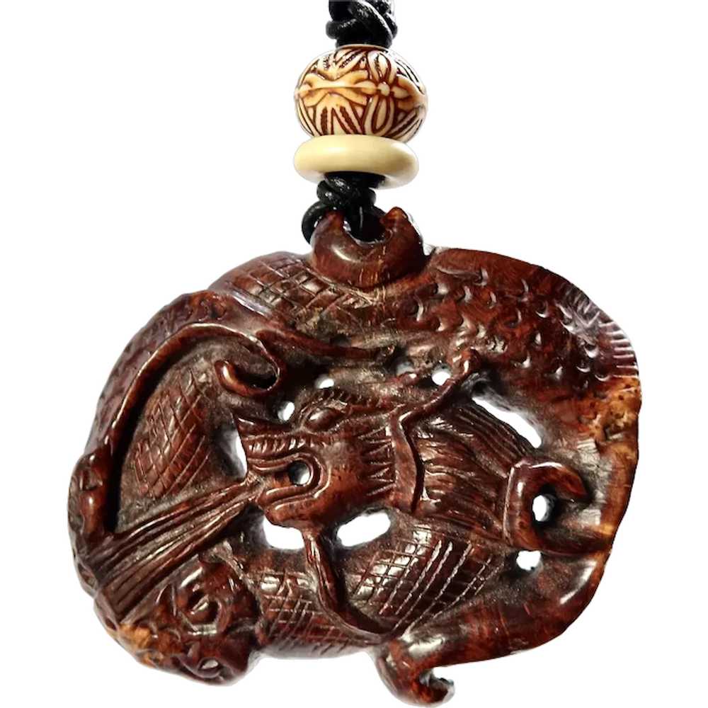Carved Wood Chinese Dragon Pendant Necklace - image 1
