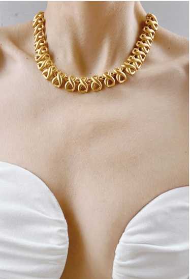 Anne Klein gold tone infinity necklace