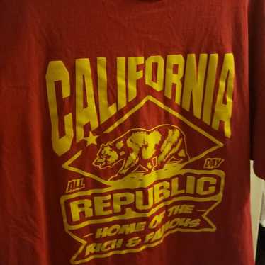 Red and gold tshirt - image 1