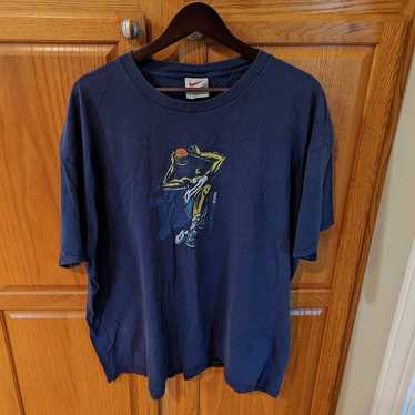 Vintage Nike man jumping Basketball player navy B… - image 1