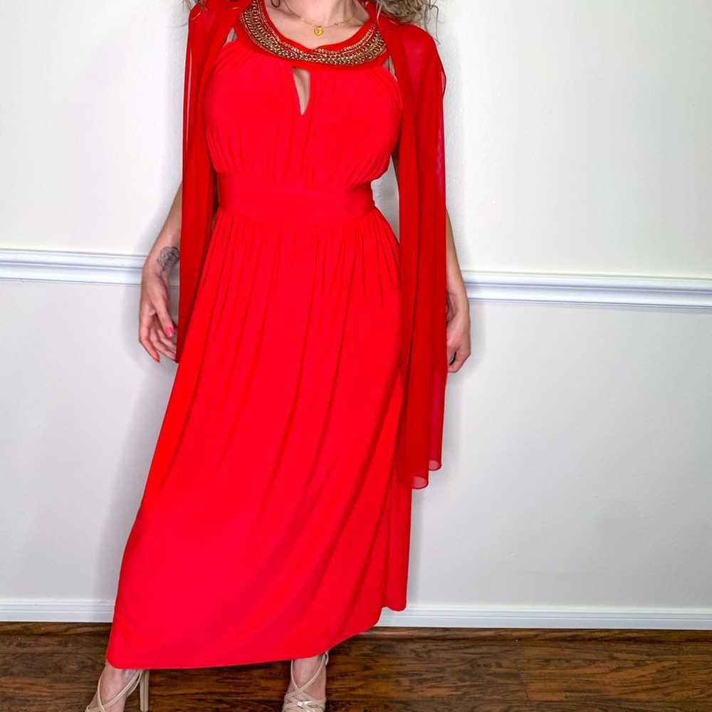 Red gown with detailed collar - image 1