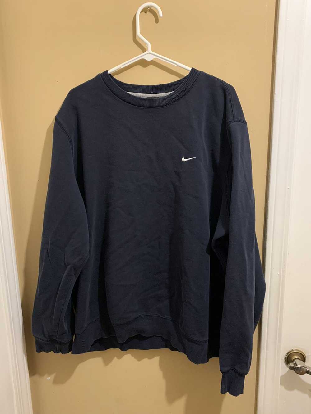 swoosh sweater