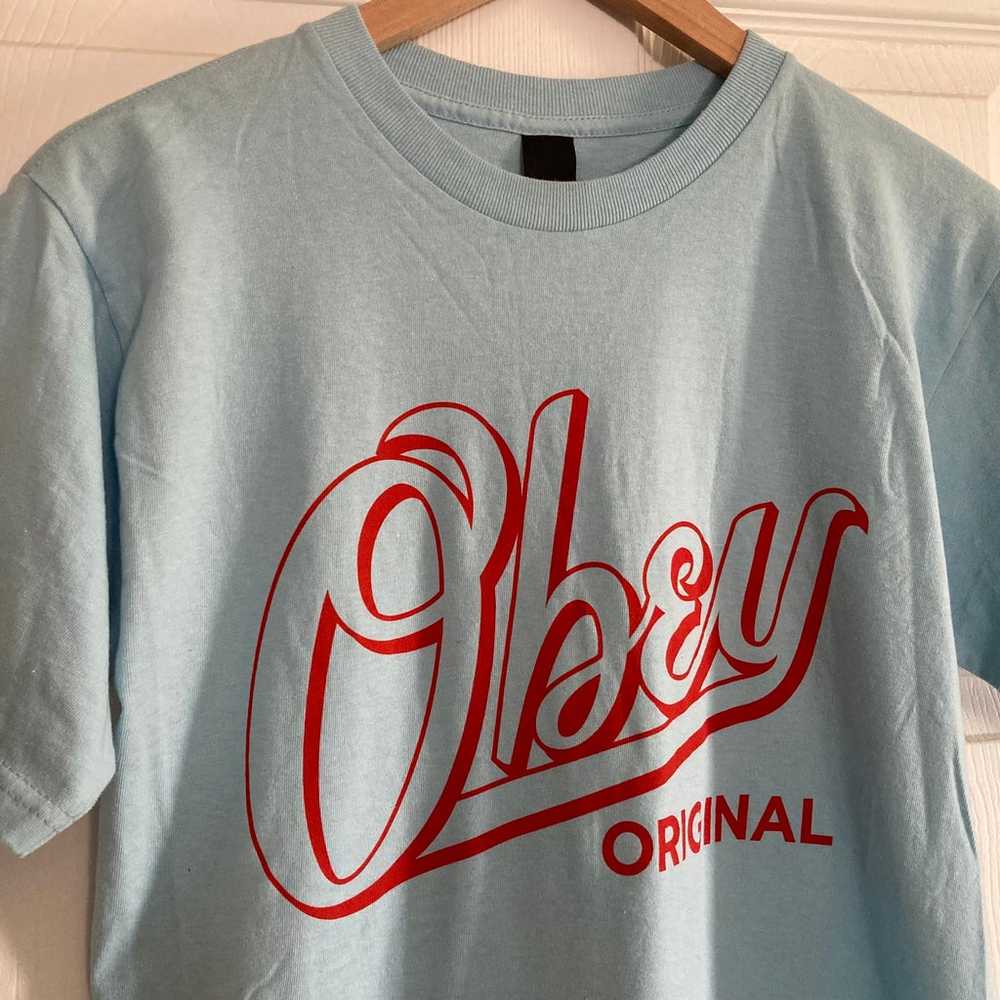NEW!  Obey graphic logo men’s tee in blue/red com… - image 4