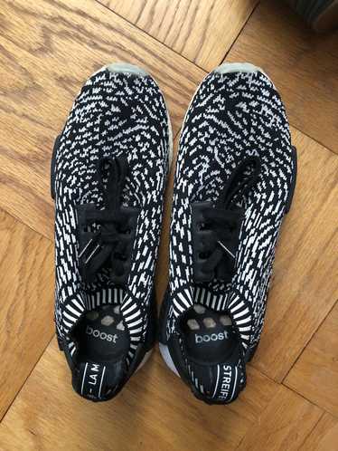 Nmd r1 zebra primeknit best sale