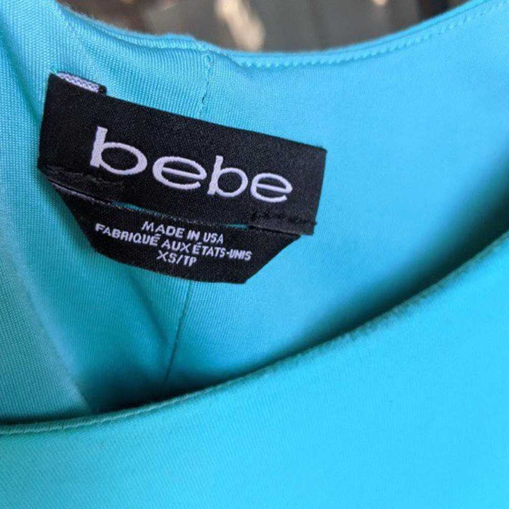 Bebe turquoise studded dress - image 4