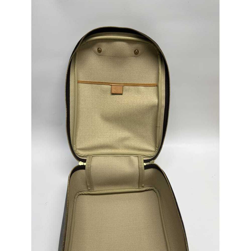 Louis Vuitton Excursion leather travel bag - image 10