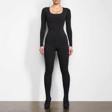 Skims all in one black onyx s catsuit onesie jumps