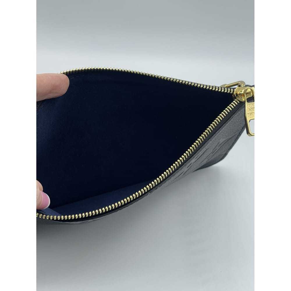 Louis Vuitton Neverfull leather clutch bag - image 7