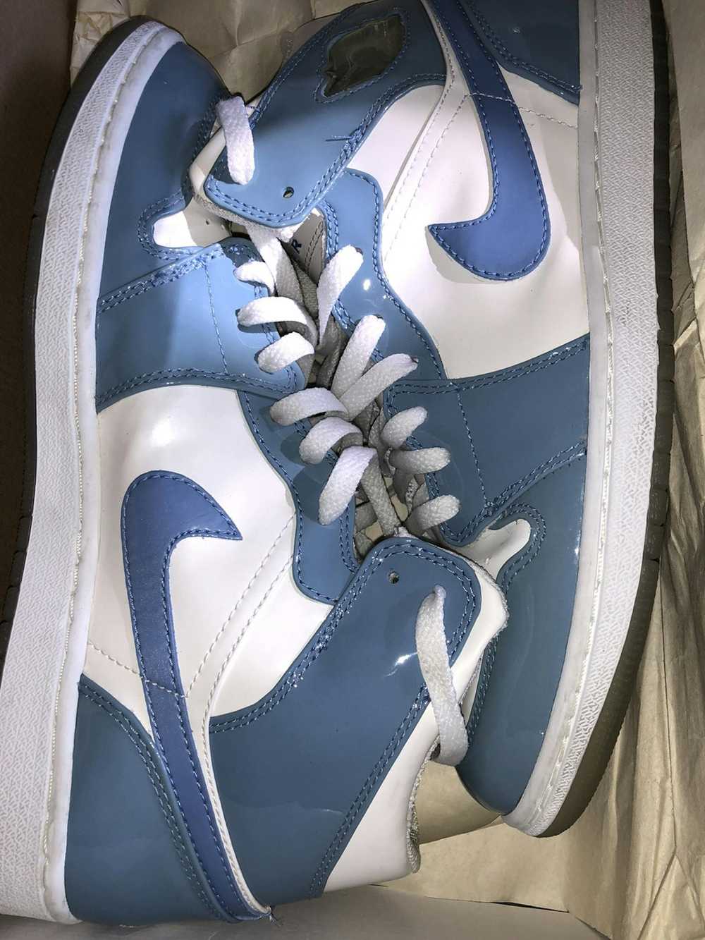 Jordan Brand Air Jordan 1 Retro UNC Patent - image 1