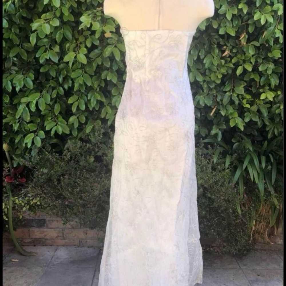 Woman’s strapless wedding dress size 6/8 - image 3