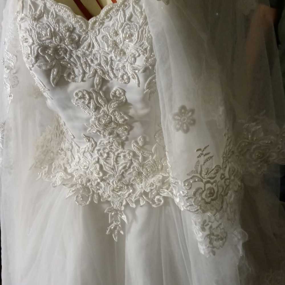 Custom hand beaded wedding dresses - image 4