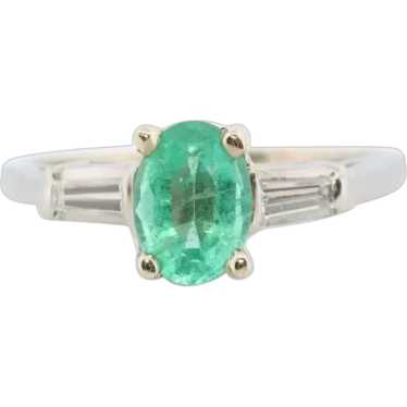 14k Oval Emerald and Baguette diamond ring. 14k wh