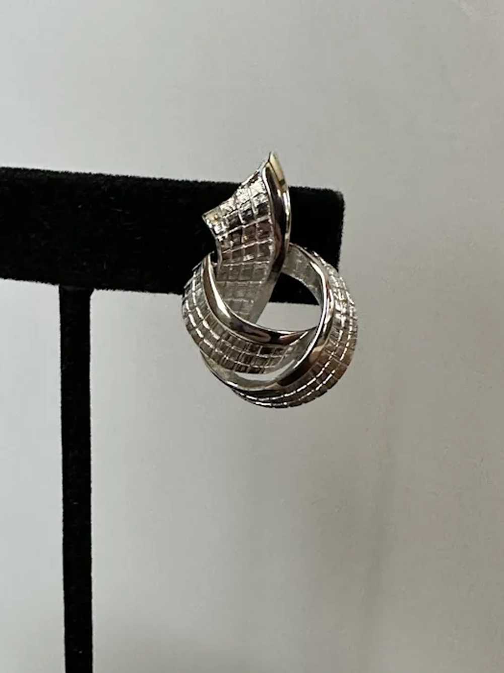 Silver Tone Knot Earrings - image 4