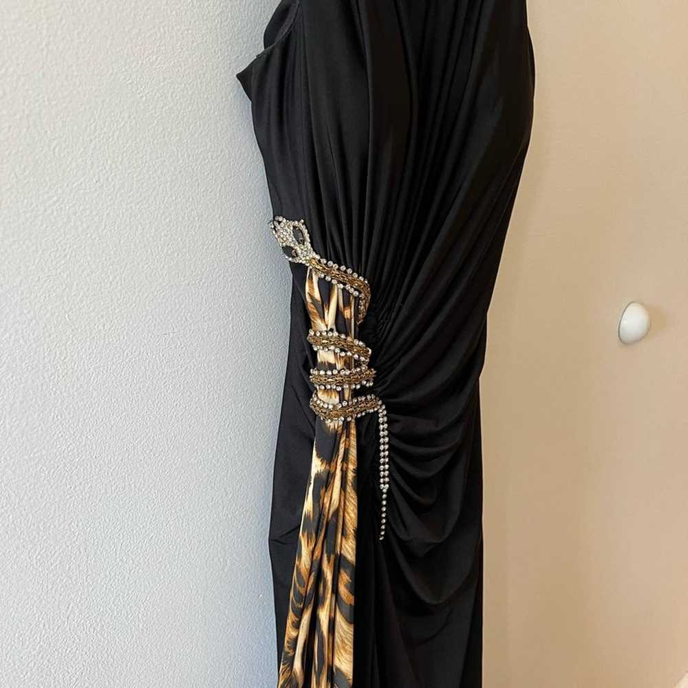 Black long dress with snake design - image 2