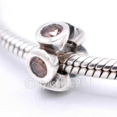 pandora Authentic PANDORA Lights Brown CZ Spacer