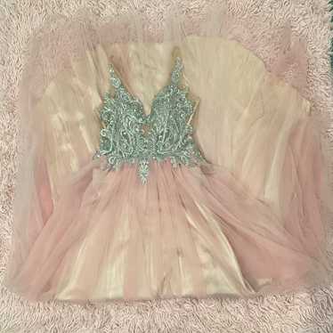 Light pink prom dress with silver bedazzled bust - image 1