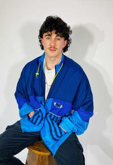 Vintage size L Hi-Tec Windbreaker Jacket In Blue