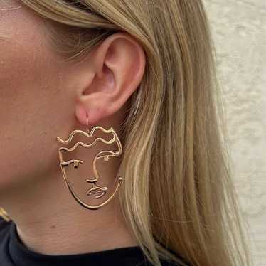 Gold Abstract Face Earrings - image 1