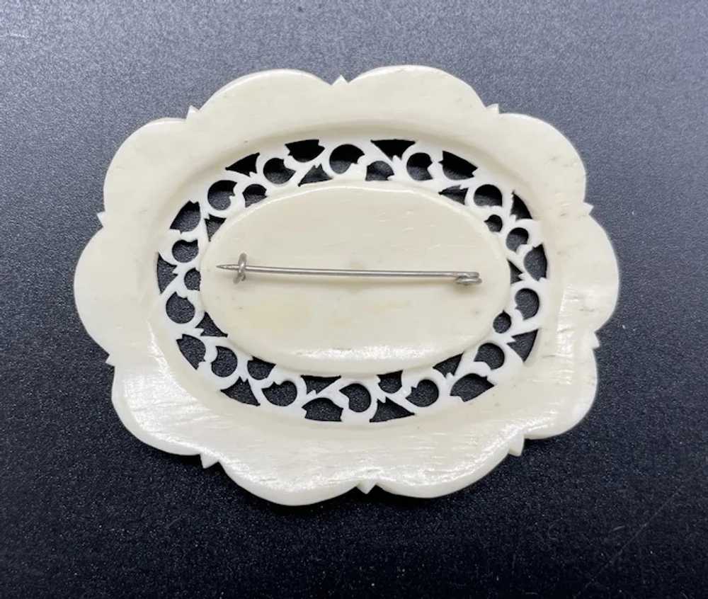Victorian style carved and painted bone brooch - image 2